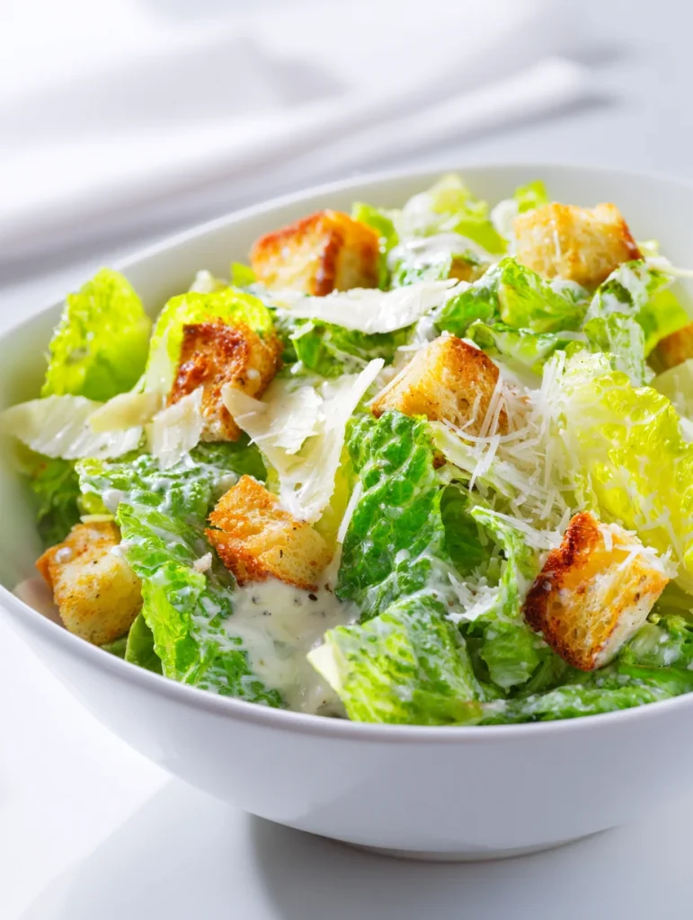Caesar salad with romaine lettuce, croutons, parmesan, and creamy dressing.
